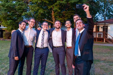 Students taking picture before Shabbat  